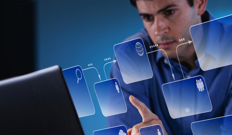 man looking at computer